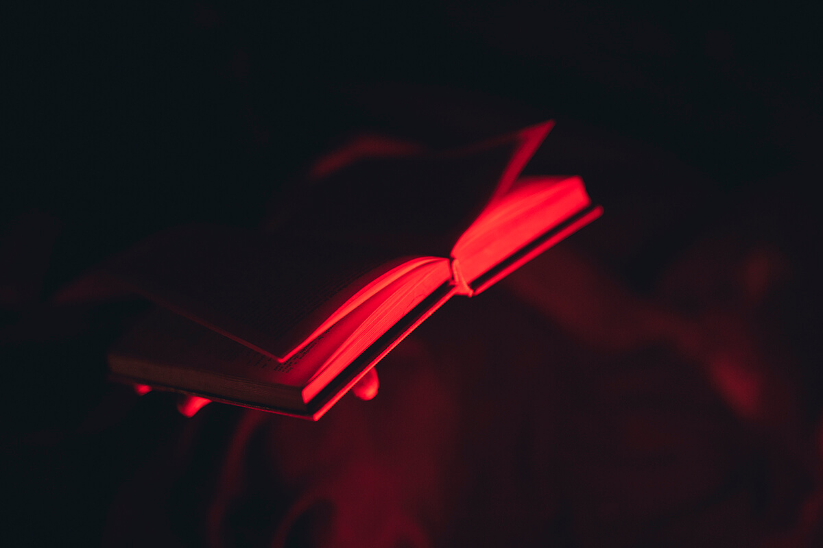 red light watching open book